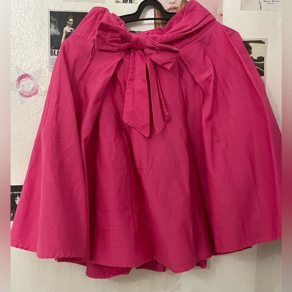 Knee-length skirt ୨୧